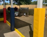 Square-canopy-post-protectors-in-red-yellow-and-navy