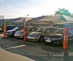 Padded post protectors for VW car dealership